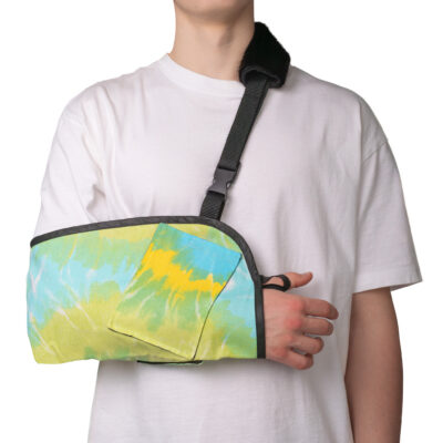 Bluish-green arm sling with adjustable belt and thumb loop for stability.