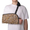 Leopard-print sling with an adjustable strap and thumb loop for added stability.