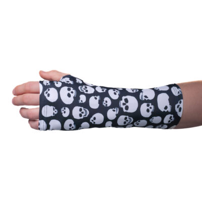 Black elastic arm cast cover with white skull pattern, protecting from dirt while healing in style.
