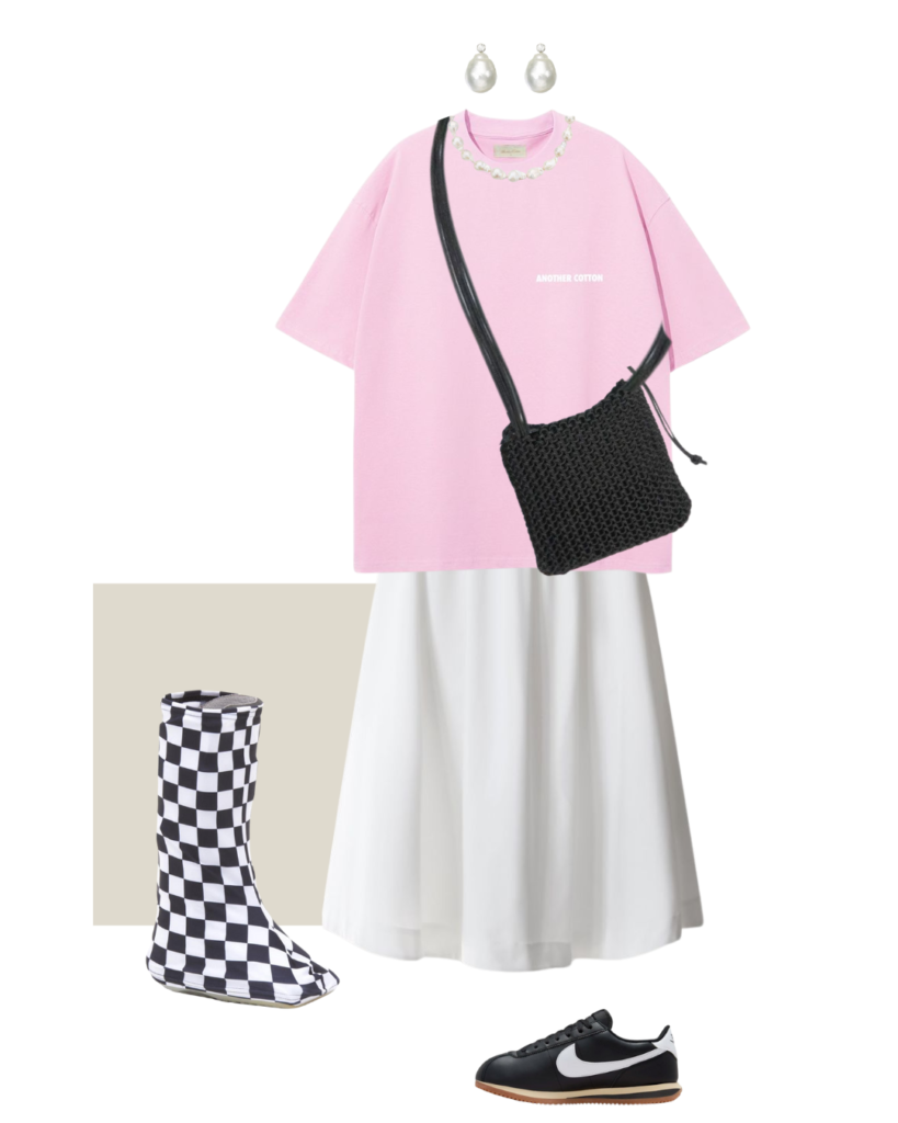 Checkered orthopedic boot cover styled with a pastel oversized shirt and trendy A-line skirt